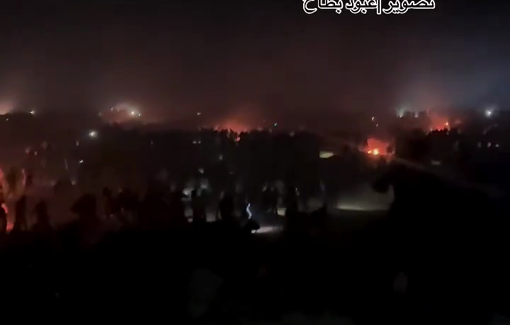 Thumbnail preview image for the video titled: Thousands flee as Israeli troops open fire on people gathered at its Netzarim "aid site"
