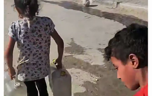 Thumbnail preview image for the video titled: Children struggle to carry water containers