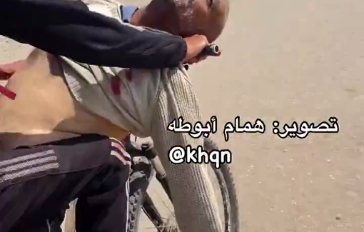 Thumbnail preview image for the video titled: Father killed by Israeli sniper at GHF aid point in Rafah; son transports body by bicycle