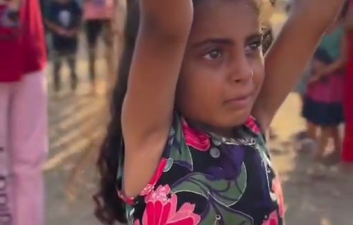 Thumbnail preview image for the video titled: Little girl overcome with emotion by a song about the plight of Palestine