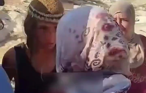 Thumbnail preview image for the video titled: Settler teens harass and stare down elderly women in Al-Mughayir