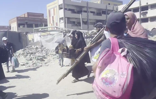 Thumbnail preview image for the video titled: Exhausted women and barefoot children displaced from Khan Younis under sweltering heat