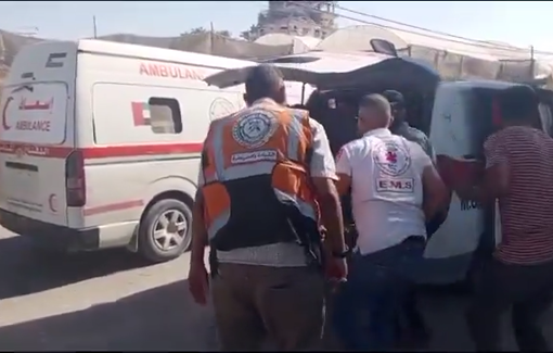 Thumbnail preview image for the video titled: Paramedics retrieve the bodies of victims on the street in Rafah