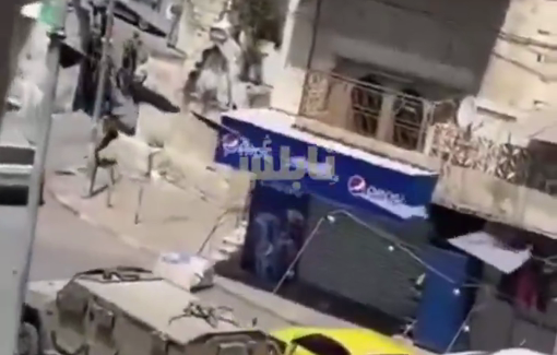 Thumbnail preview image for the video titled: IDF vehicle rams moving cars in Nablus