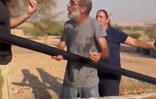 Thumbnail preview image for the video titled: Settlers harass and try to sever water lines for Palestinian farmers at Al-Auja spring