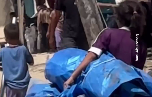 Thumbnail preview image for the video titled: Girl forcibly displaced struggles to carry her folded tent