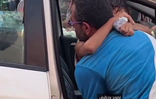 Thumbnail preview image for the video titled: A father takes out his son out of Al-Aqsa Martyrs Hospital