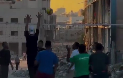 Thumbnail preview image for the video titled: Palestinians play volleyball amidst the rubble of their destroyed homes in Gaza.