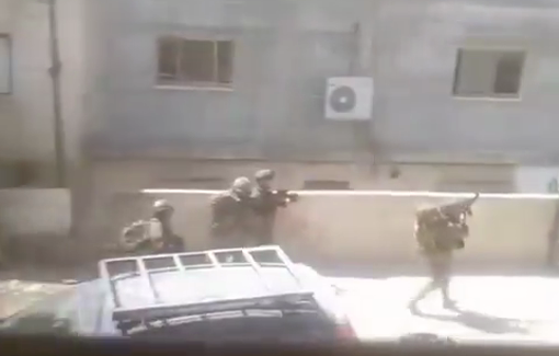 Thumbnail preview image for the video titled: IDF soldiers, accompanied by police dogs, storming a house in Nour Shams camp