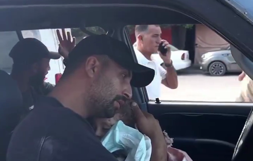 Thumbnail preview image for the video titled: Father embraces his two daughters killed after IDF targeted their house