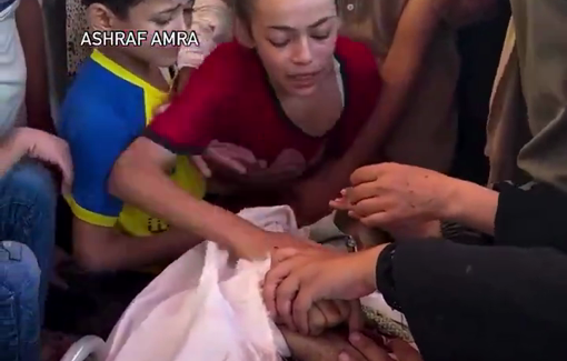 Thumbnail preview image for the video titled: A grieving young girl weeps as she bids farewell for her father killed by IDF airstrike in Deir el-Balah