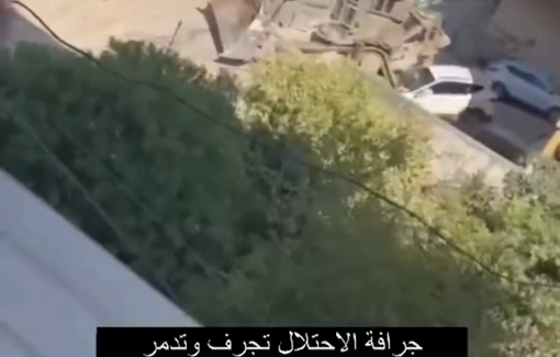 Thumbnail preview image for the video titled: IDF bulldozer bent on crushing a car in Tulkarem street