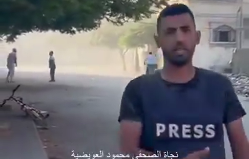 Thumbnail preview image for the video titled: Journalist Mahmoud Al-Awadiya was meters away from an Israeli airstrike