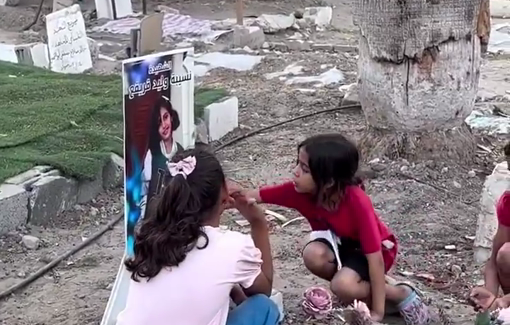 Thumbnail preview image for the video titled: As the world’s children go to school, Gaza’s children tend the graves of their classmates