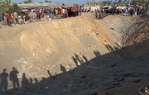 Thumbnail preview image for the video titled: Al-Mawasi massacre aftermath: People search for belongings among the wreckage