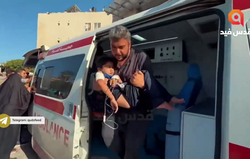 Thumbnail preview image for the video titled: Wounded arrive at Al-Aqsa hospital after IDF bombing on Al-Jaouni school