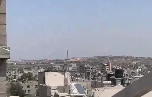 Thumbnail preview image for the video titled: Large Israeli flag hoisted over the rubble of northern Gaza