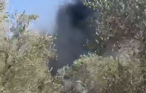 Thumbnail preview image for the video titled: Israeli settlers set fire to olive trees and agricultural equipment in the village of Yatma