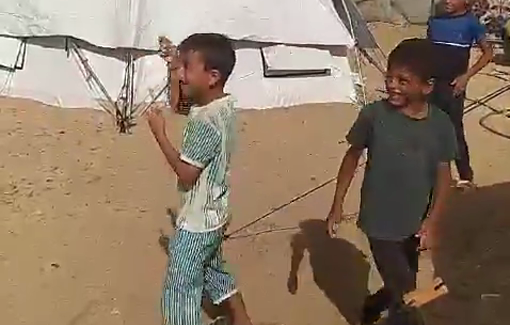 Thumbnail preview image for the video titled: My son Amir flying a white kite with a long tail over Mawasi camp today