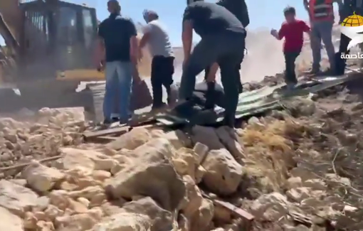 Thumbnail preview image for the video titled: Scenes document the Aliyan family's confrontation with Israeli bulldozers as they razed the family's land in Khirbet Tabalya