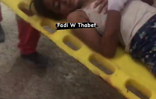 Thumbnail preview image for the video titled: Wounded little girl whimpers in pain while being carried into the hospital