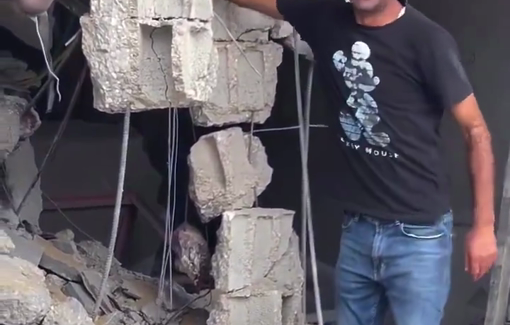 Thumbnail preview image for the video titled: Dead body stuck in the rubble dangling down from from ceiling