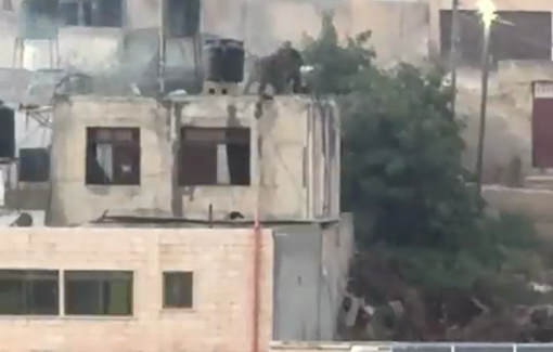 Thumbnail preview image for the video titled: Soldiers throw three more bodies of killed Palestinians from the roof of besieged building