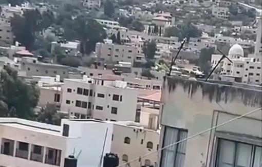 Thumbnail preview image for the video titled: Soldiers summarily execute Palestinians on the roof of besieged building