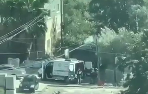 Thumbnail preview image for the video titled: Israeli soldiers search an ambulance in Qabatiya after transporting an injured young man