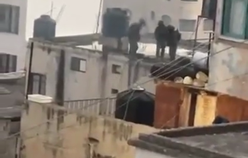 Thumbnail preview image for the video titled: Another angle of soldiers throwing bodies of Palestinians off a roof in Qabatiya