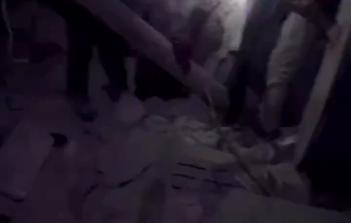 Thumbnail preview image for the video titled: First responders rescue woman and children at bombed Hajji family home