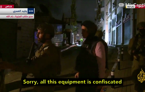 Thumbnail preview image for the video titled: IDF troop confiscates Al Jazeera crew equipment even outside the building