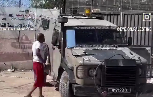 Thumbnail preview image for the video titled: A Palestinian confronts an Israeli military vehicle whilst the occupation raids Jenin city