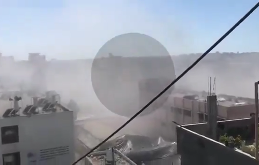 Thumbnail preview image for the video titled: Israeli airstrike on Hafsa School viewed form afar