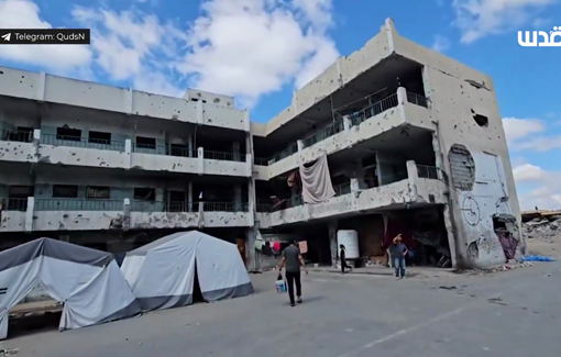 Thumbnail preview image for the video titled: Displaced Palestinians return to Ibn al-Haytham school one week after massacre