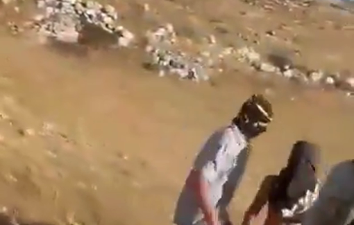 Thumbnail preview image for the video titled: Masked Israeli settlers attacked foreign activists who were accompanying Palestinian farmers in the village of Susya