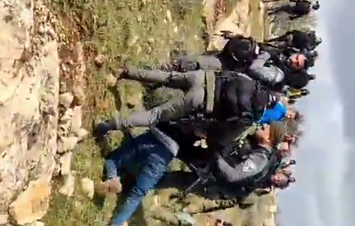 Thumbnail preview image for the video titled: Israeli occupation forces beat a young Palestinian man and arrested him on their land near the village of Susya