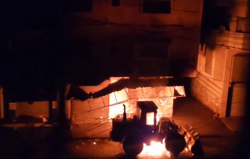 Thumbnail preview image for the video titled: Israeli drone drops sets al-Jaouni family's bulldozer on fire