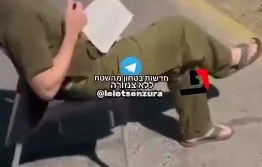 Thumbnail preview image for the video titled: Israeli settler soldiers mockingly recite Talmudic lessons to bound Palestinian civilians