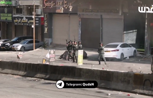 Thumbnail preview image for the video titled: During their raid in Qalandia, Israeli soldiers fire live ammunition towards civilian homes