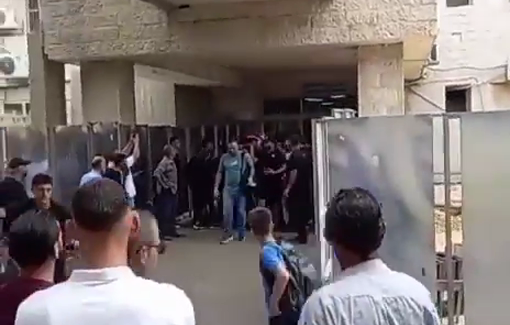 Thumbnail preview image for the video titled: The funerals of martyr Hatem Ghaith and his exit carried on shoulders