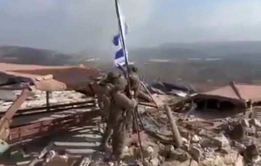 Thumbnail preview image for the video titled: Soldiers raise Israeli flag over Lebanon