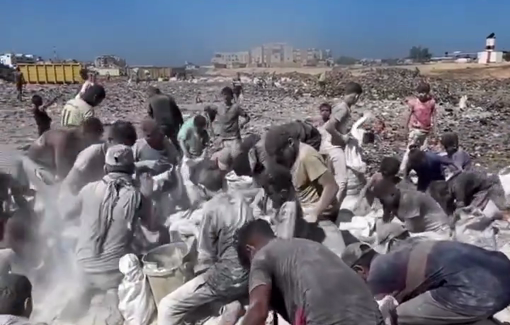 Thumbnail preview image for the video titled: Youths gather to collect spoiled flour in Khan Younis