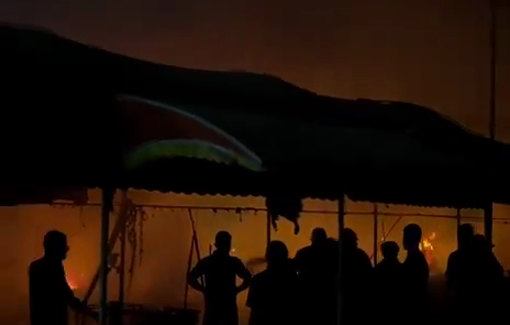 Thumbnail preview image for the video titled: Attempts to douse fire after IDF bombing of tents