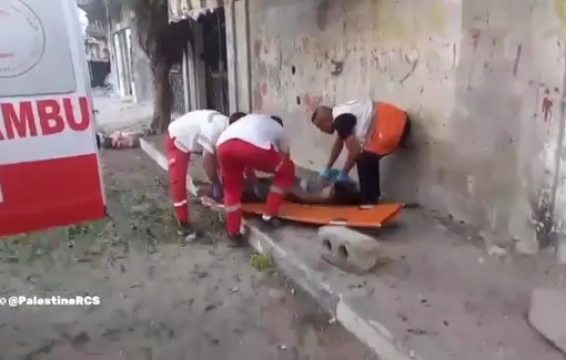 Thumbnail preview image for the video titled: Palestine Red Crescent teams transferred the body of a murdered civilian to Al-Ahli Baptist Hospital.