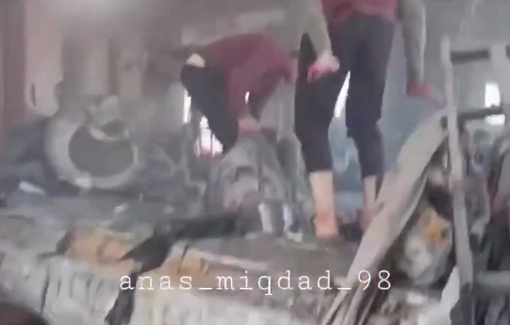 Thumbnail preview image for the video titled: Children, dead and wounded, pull out of massacre scene at Shuhada school