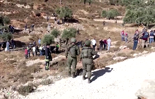 Thumbnail preview image for the video titled: Reuters reporting on the olive harvest under Israeli soldiers and settlers attacks in the West Bank