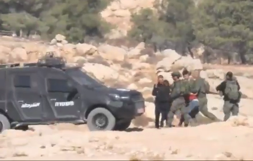 Thumbnail preview image for the video titled: Israeli military and police arrest farmers harassed by an Israeli extremist settler in Masafer Yatta