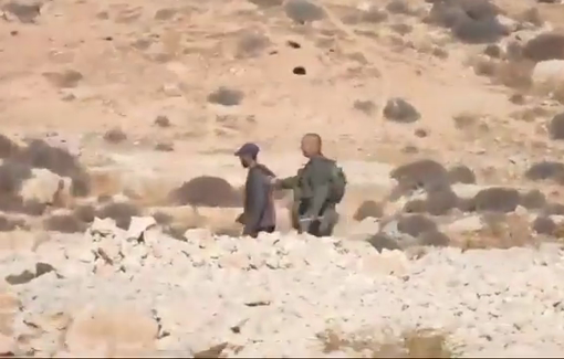 Thumbnail preview image for the video titled: Israeli military and police arrest farmers harassed by an Israeli extremist settler in Masafer Yatta