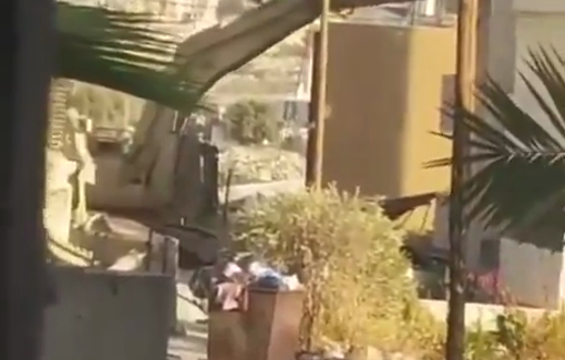 Thumbnail preview image for the video titled: Israeli bulldozers demolish a residential apartment after besieging it during their raid